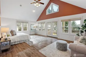 Spacious main floor primary bedroom.