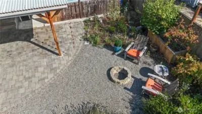 Aerial view showcasing the wonderful firepit - ready to host all of your outdoor gatherings!