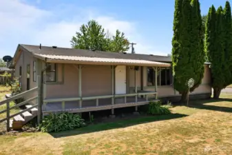 Home front with welcoming covered porch.