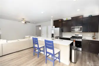 Stunning kitchen with quartz counters and lots of natural light