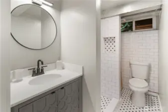 This is the recently remodeled lower-level bathroom, with shower.