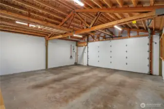 The clean and spacious oversized garage can also be used for a shop space if you so desire!