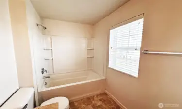 Guest bathroom with window, great for ventilation!