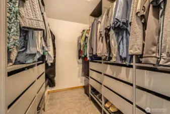HUGE CUSTOM WALK-IN CLOSET.