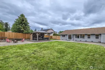 GORGEOUS LARGE BACKYARD WITH WONDERFUL LANDSCAPING. LOTS OF ROOM FOR PLAY AND PETS.