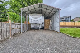 COVERED RV/BOAT PARKING (20’ X 35’) BEHIND THE SECURE GATE.