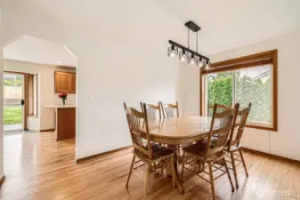 BEAUTIFUL FORMAL DINING AREA WITH EFFORTLESS ACCESS TO KITCHEN.