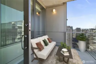 A perfect covered deck space for enjoying the northwesterly views of city and Olympics