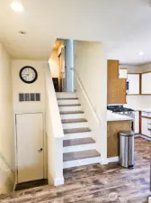 Mezzanine level with bathroom and second bedroom.