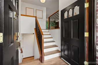 The welcoming entry floods with natural light.