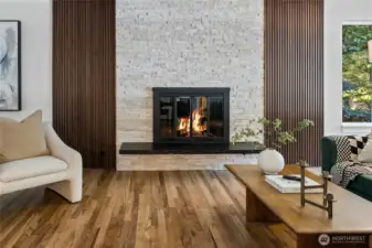 Cozy fall evenings await in front of the fluted fireplace.