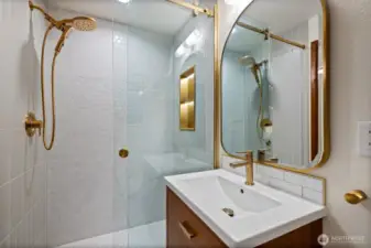 Relax in a luxurious shower complete with a light up niche.