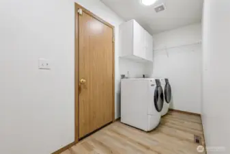 Spacious Laundry room as you enter from the garage.