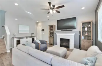 As you enter, you will find your open concept family room and kitchen, door to garage is to left of fireplace, closet is there as well.