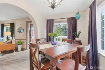 also arched entry into the bright dining room