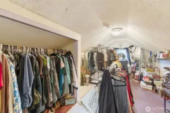 Other end of upper level bedroom with closet