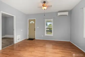 Living room with ductless heat pump