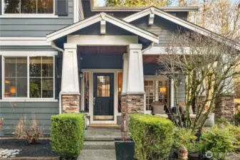Entry with peaceful covered porch