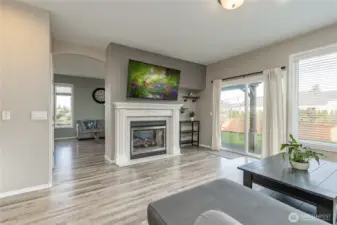 View of the double-sided fireplace from the family room