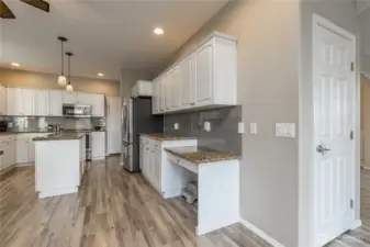 Extensive counter space and cabinetry, plus a walk-in pantry!