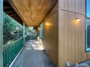 Side of deck with front entrance.