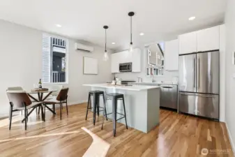 A space that's truly made for entertaining, with easy flow from the living room into the kitchen where you can gather around the spacious center island.