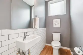 Handy half bath on the main level.