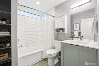 Stylish full bathroom on the lower level.
