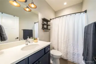 View of upper level full bathroom.