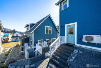 Exterior view of home with carriage house.