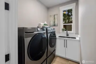 Convenient second floor laundry room.