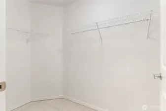 Primary walk in closet.
