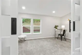 Family Room/Den w/Recessed Lighting w/Double Doors and New Carpet.