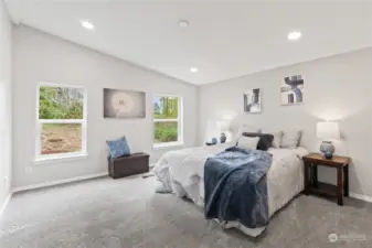 Primary Bedroom w/Vaulted Ceiling, Recessed Lighting and En Suite Bath.