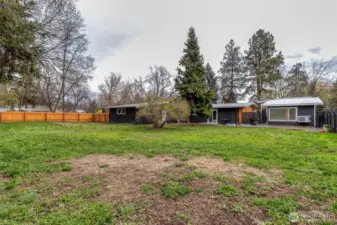 Fully fenced side yard to the North