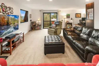 Enjoy glimpses of the water and territorial views of the neighborhood from this southwest-facing upper floor space.
