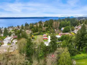 The home backs up to the Salmon Creek Ravine, offering exceptional privacy.