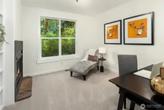 Main Floor Den with a Gas Fireplace