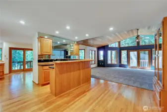 Entering the home you'll see the gleaming hardwood floors and the fun wet bar.  Hosting would be a dream in this home.