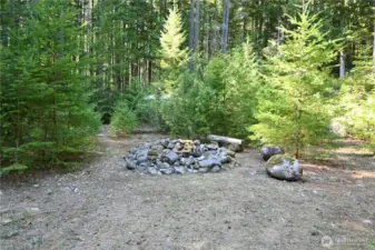 A massive firepit for shared stories.