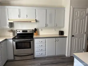 More cabinets by the stove area