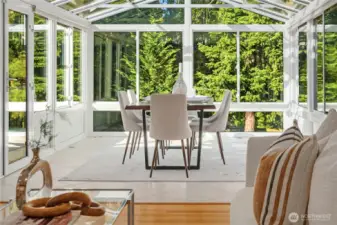 Imagine not only intimate gatherings, but special holidays in this stunning solarium with heated floors and window blinds.Access door to the backyard.