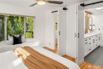 The left door enters into a walk-in closet with room for a dresser. Right door; 2025 remodeled bathroom with heated floors, Bluetooth Exhaust Fan, Toto Washlet Toilet with heated seats and dryer. Anti-fog/Shatterproof Dimmable LED Mirrors