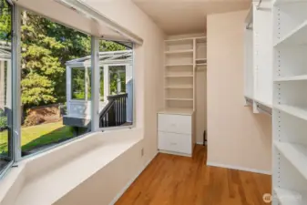 Primary walk-in closet with room for a dresser and so much more