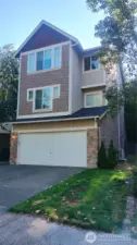 The home has a two car garage that leads onto the ground level with hallway to full bathroom, storage closet and 4th bedroom with is a rec room sized room with two windows and quadruple wide closets!