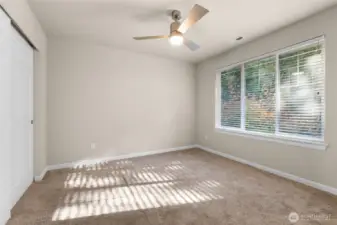 Top floor bedroom on north east side (ceiling fan light fixture)