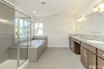 spacious primary bathroom.