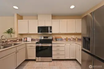 Freshly painted with new hardware and a suite of stainless-steel appliances.