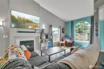 Living room with a cozy gas fireplace