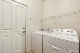 Come in from the garage to a laundry room - washer & dryer included.